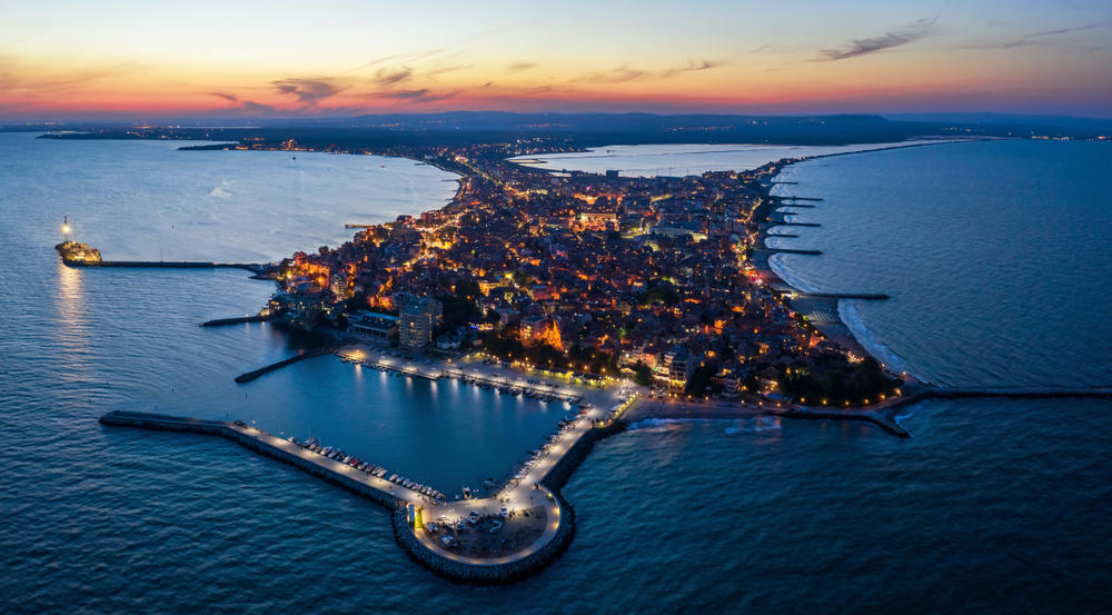 Aerial drone view at night to Pomorie city on the Bulgarian Black Sea coast